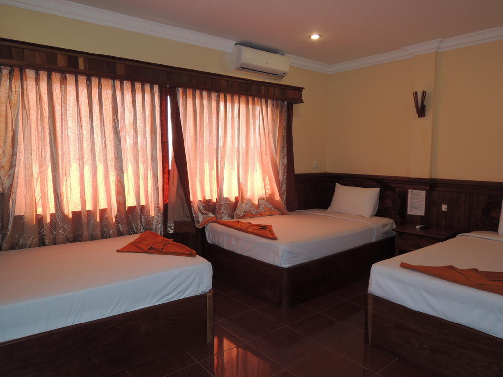 Banan Hotel Battambang Zimmer foto